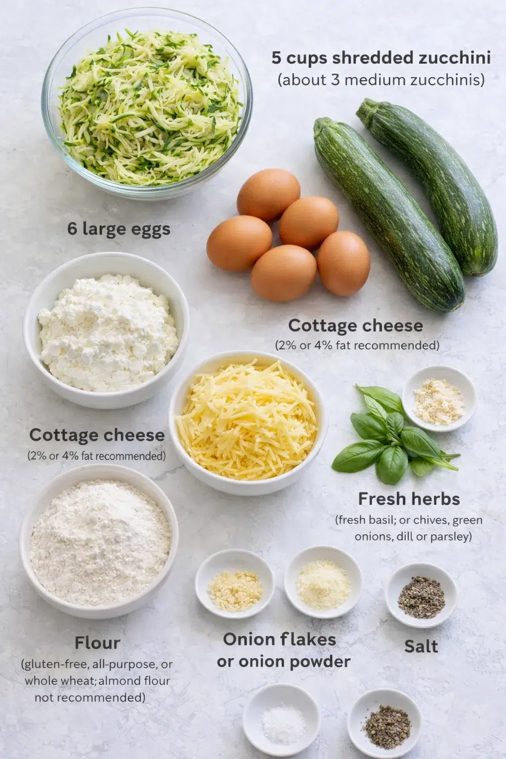 ingredients-placeholder.png Measured ingredients arranged for Crustless Cottage Cheese Zucchini Quiche: 5 cups shredded zucchini (about 3 medium zucchinis), 6 large eggs, Cottage cheese (2% or 4% fat recommended), Shredded cheese (sharp cheddar, go