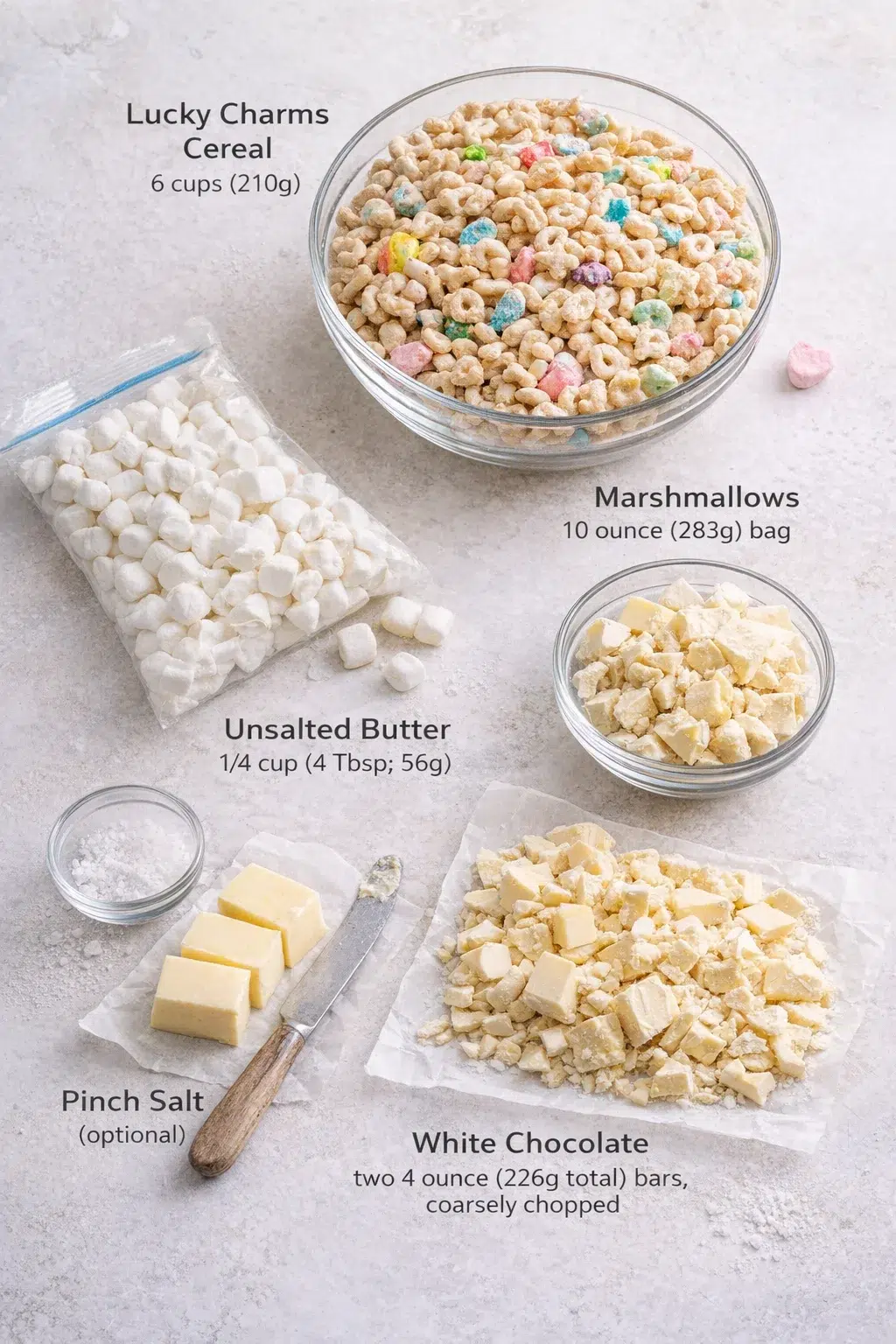 ingredients-placeholder.png Measured ingredients arranged for White Chocolate Lucky Charms Treats - Sally's Baking: 6 cups (210g) Lucky Charms cereal, 1/4 cup (4 Tbsp; 56g) unsalted butter, 10-ounce (283g) bag of marshmallows (mini size or regular)