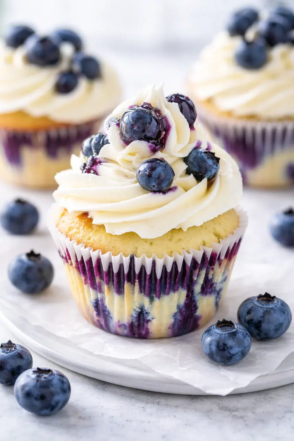 Final plated Easy White Chocolate Blueberry Cupcakes Recipe served as a hero shot