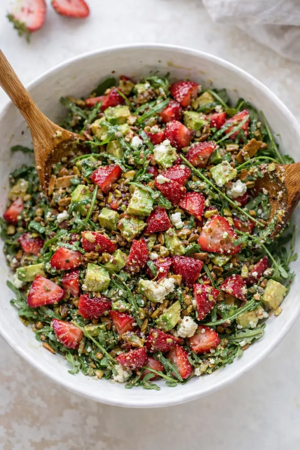 step-process-placeholder-13-13.png Hands gently tossing salad with tongs until leaves are coated and goat cheese begins softening.