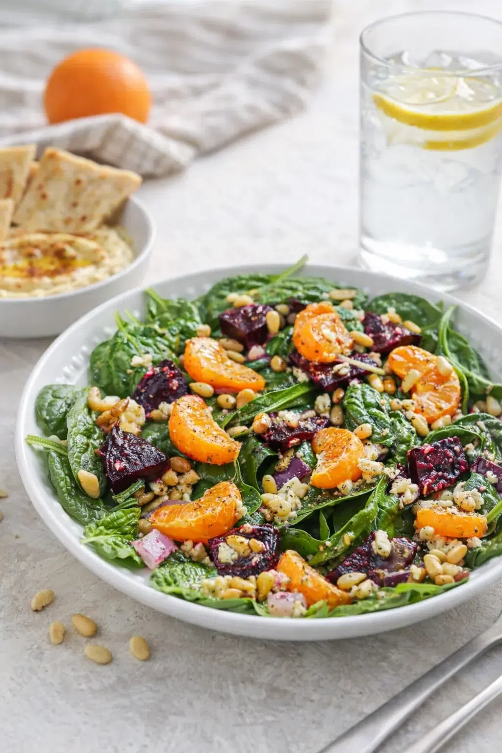 closing_final_dish-placeholder.png Alternative angle of Beet Salad with Spinach and Honey-Mustard Lemon Dressing served with a pairing