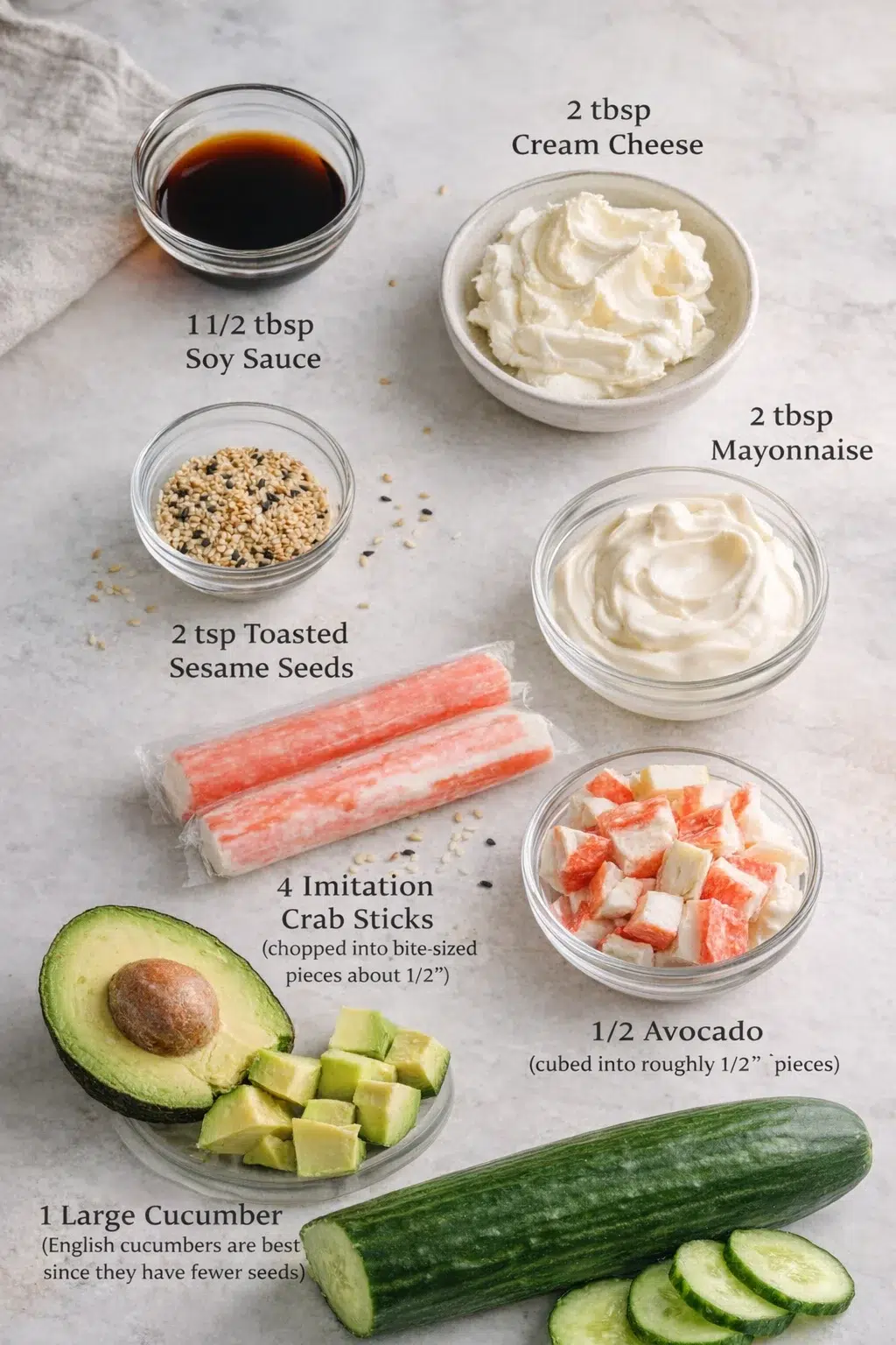 ingredients-placeholder.png Measured ingredients arranged for Easy California Roll Cucumber Salad: 1 1/2 tbsp soy sauce, 2 tbsp cream cheese (softened to room temperature for easy mixing), 2 tbsp mayonnaise, 2 tsp toasted sesame seeds (for a nutty