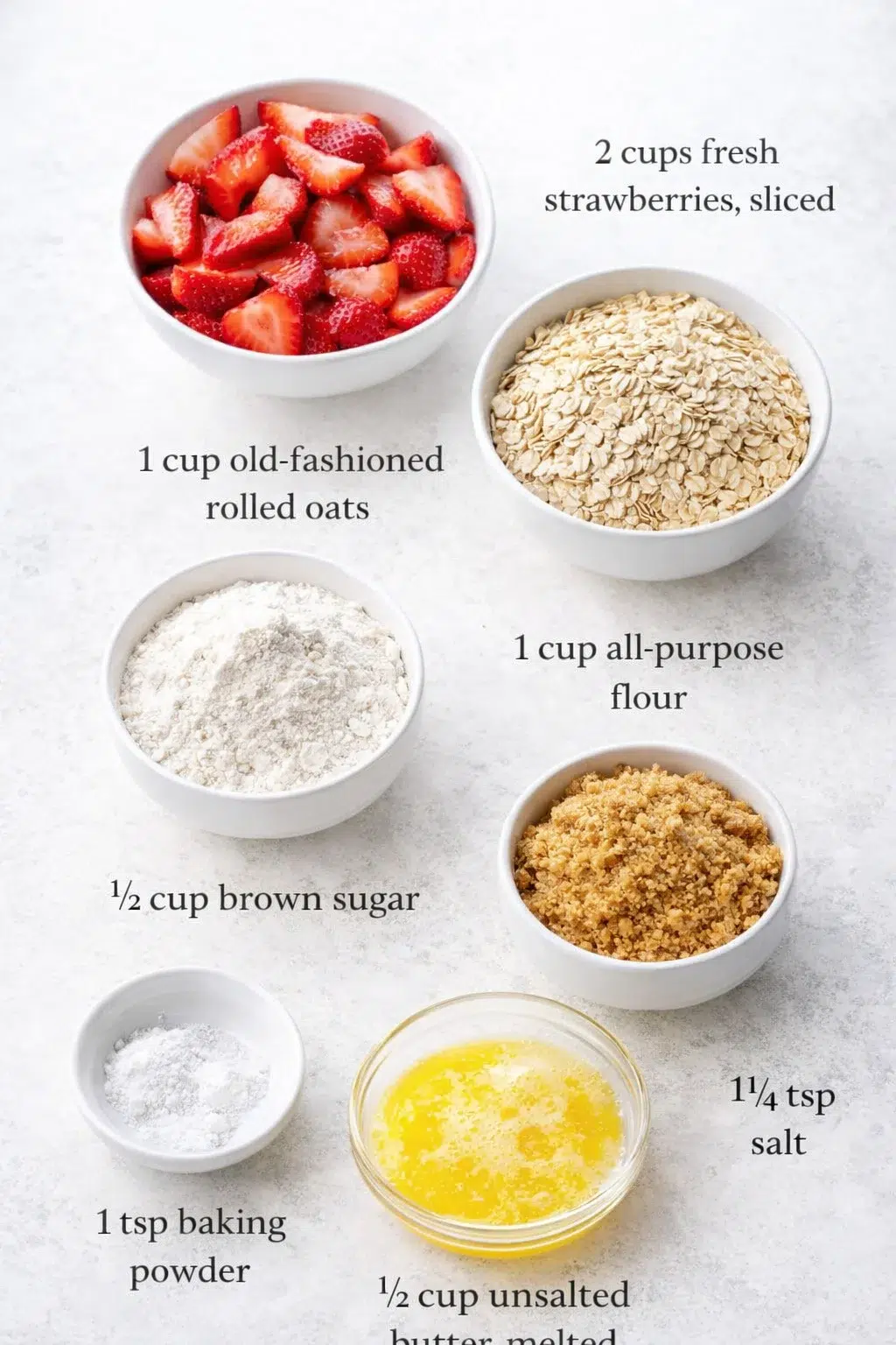 ingredients-placeholder.png Measured ingredients arranged for Easy Strawberry Oatmeal Crumble Bars Recipe: 2 cups fresh strawberries, sliced, 1 cup old-fashioned rolled oats, 1 cup all-purpose flour, 1/2 cup brown sugar, 1/2 cup unsalted butter, me