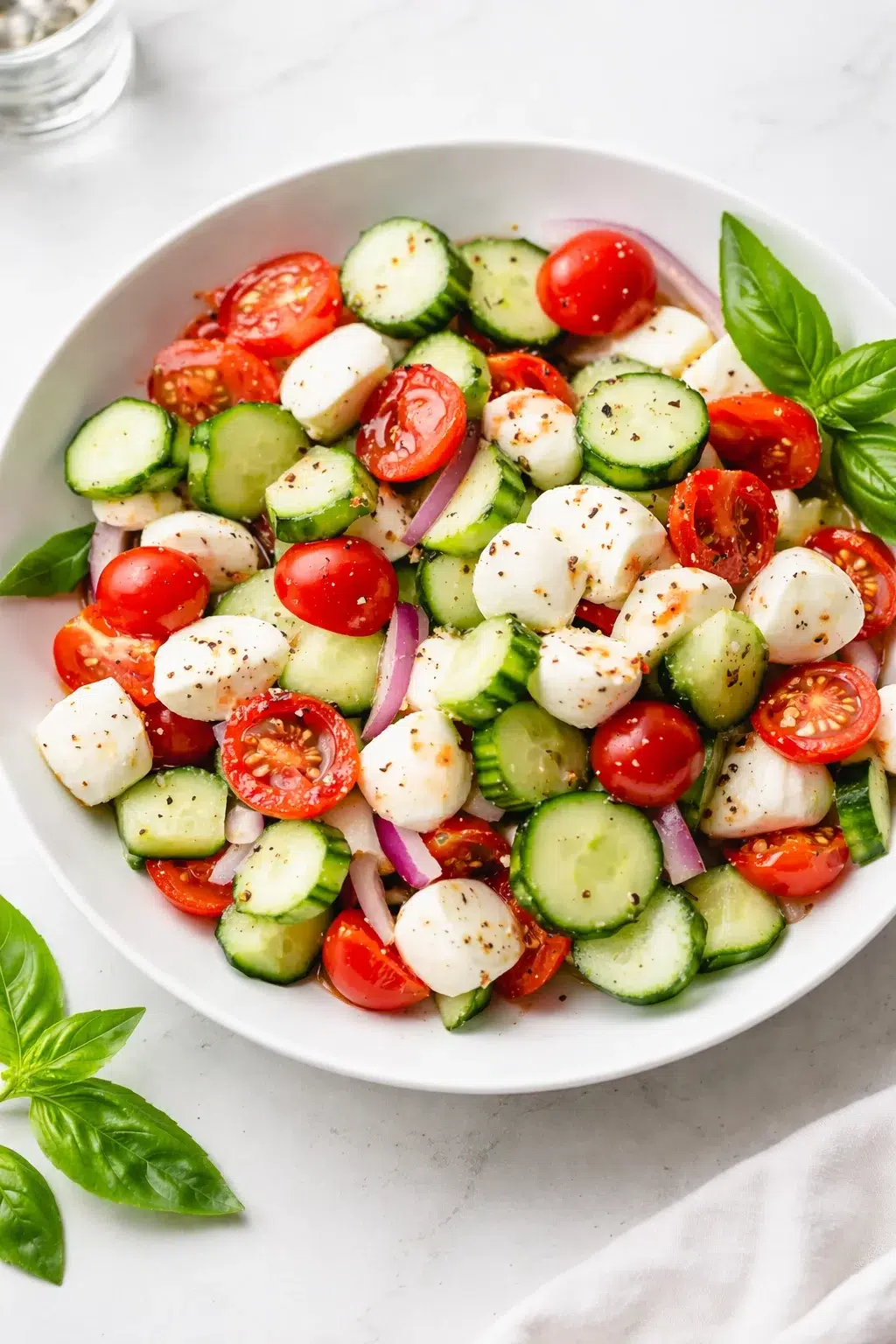 intro_final_dish-placeholder.png Final plated Fresh Cucumber Caprese Salad served as a hero shot