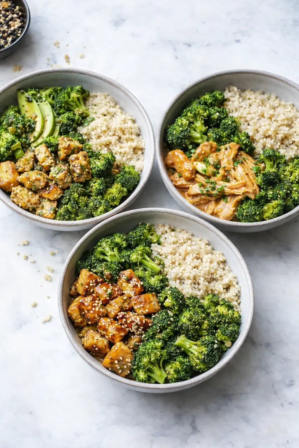 variations-placeholder.png Variation ideas for Delicious Broccoli Chicken Quinoa Bowl with Herb Dressing shown in a styled layout