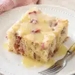 Single plated variation of Rhubarb Cake with Butter Sauce shown in a natural kitchen scene